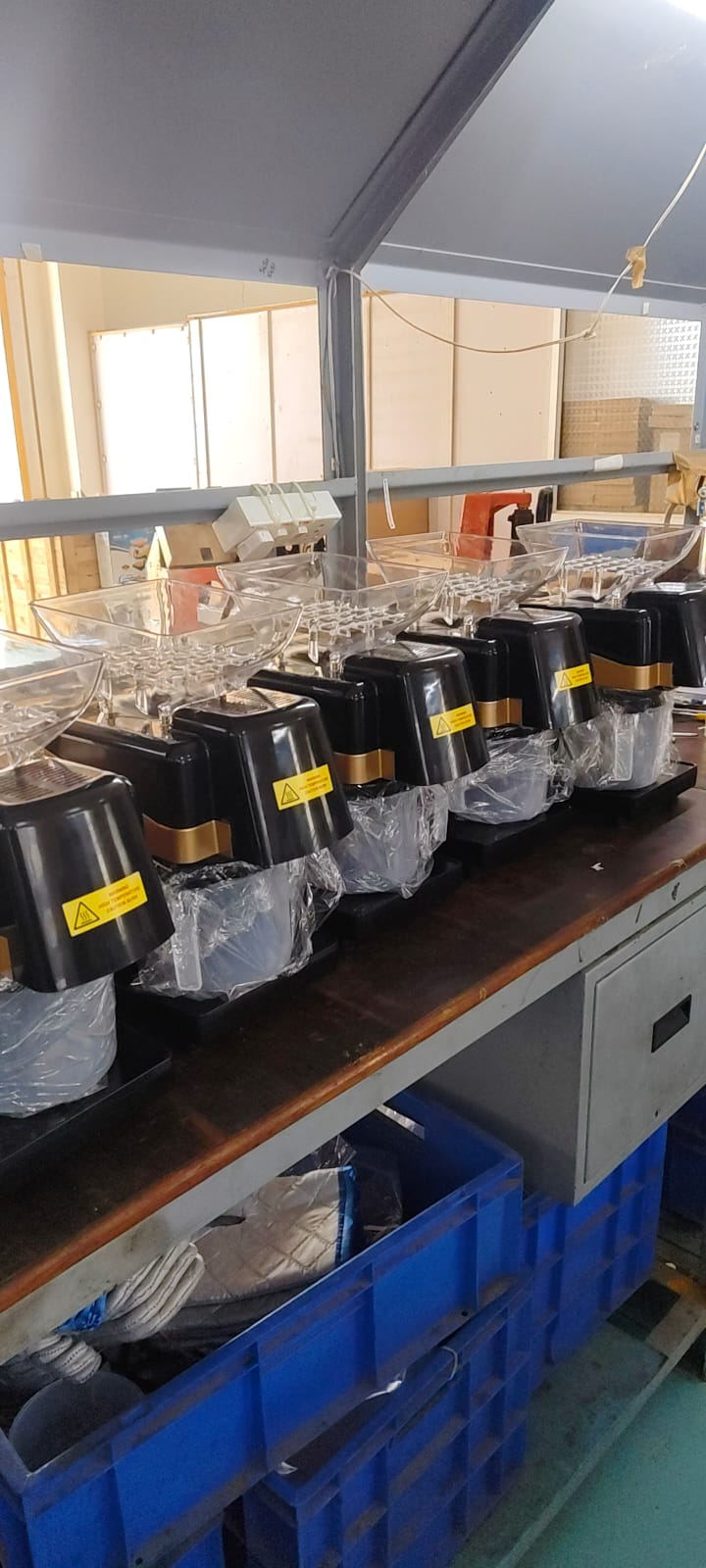 An array of Hakura machines on the factory production line